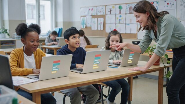 Children Learning to Code on Laptops in a Classroom