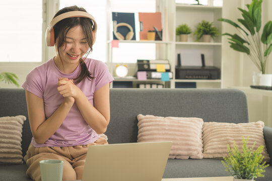 Young Asian Woman Working Online, Relaxing and Practicing Self Care During Daily Life at Home