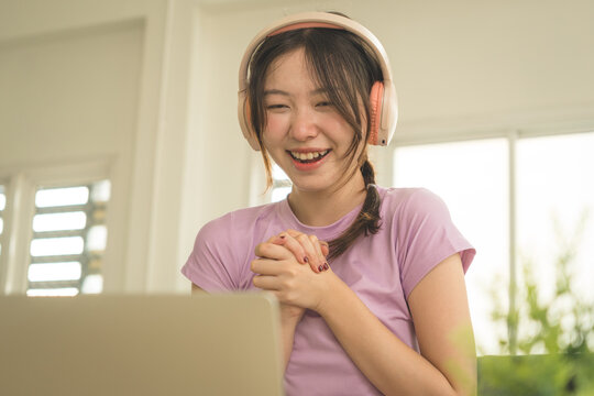 Young Asian Woman Working Online, Relaxing and Practicing Self Care During Daily Life at Home