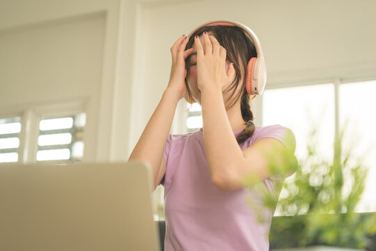 Young Asian Woman Working Online, Relaxing and Practicing Self Care During Daily Life at Home
