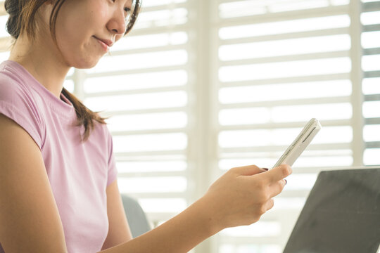 Young Asian Woman Working Online, Relaxing and Practicing Self Care During Daily Life at Home