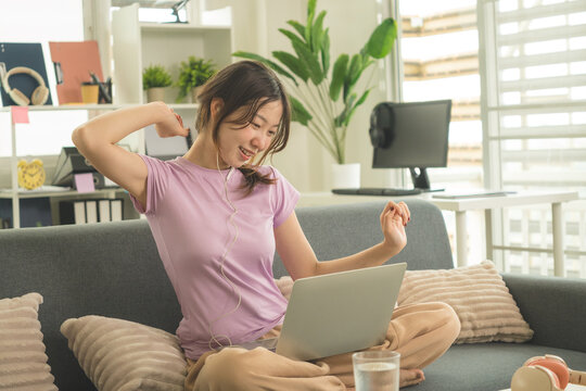 Young Asian Woman Working Online, Relaxing and Practicing Self Care During Daily Life at Home