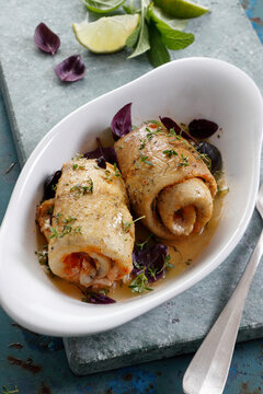 Baked pike fillet roll