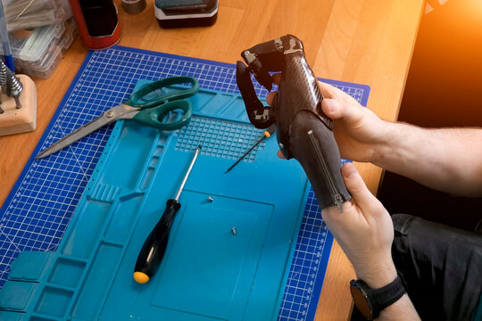 Setting up and adjusting a neurally connected hand prosthesis by a prosthetic technician