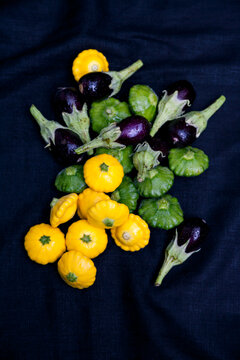 Yellow patissons - green patissons and mini eggplants