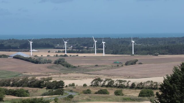 Tversted, Denmark Wind turbines in a windy seaside agricultural landscape in northern Jutland. 