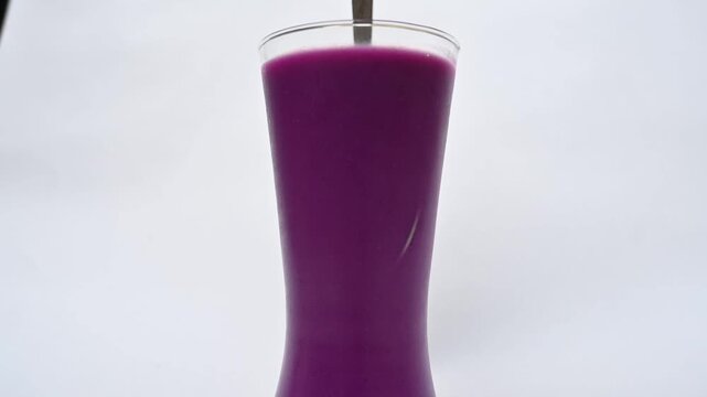 Syzygium cumini fruits juice. Its other names is Malabar plum, Java plum, black plum, jamun and jambolan. This fruit has anti diabetic properties. Indian jamun juice. Healthy drink. Fruit juice. 