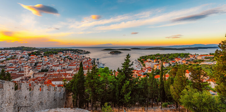 Hvar town and Pakleni Islands viewed from the medieval Spanish Fortress, golden hour over the Adriatic sea, Croatia.