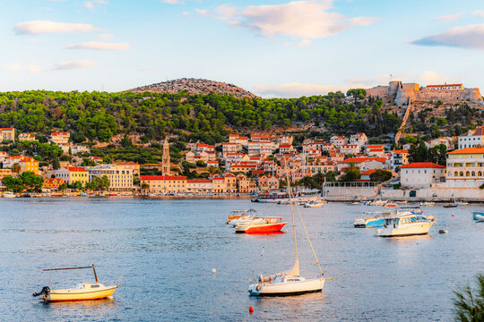 Hvar town and Pakleni Islands viewed from the medieval Spanish Fortress, golden hour over the Adriatic sea, Croatia.
