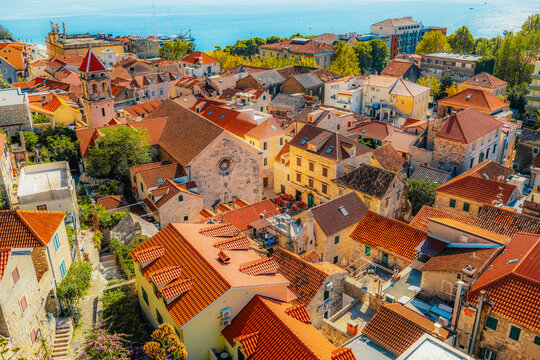 Omis old town and the Adriatic sea from the historic Mirabella fortress, terracotta roofs and the Cetina river in Croatia.
