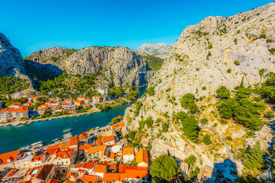 Omis old town and the Adriatic sea from the historic Mirabella fortress, terracotta roofs and the Cetina river in Croatia.