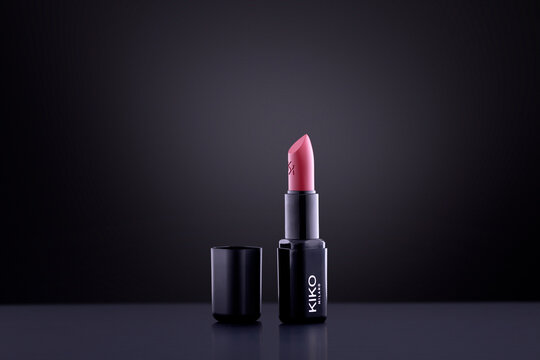KIKO Milano Pink Lipstick in Black Cosmetic Case on Dark Background