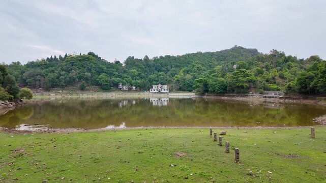 Panoramic View Of Shyamalatal Lake And Historical Ashram Reflecting In Calm Water
