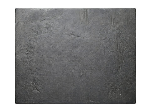 A rectangular slab of dark gray cast iron with a rough textured surface isolated on a white background