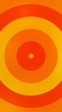 Vibrant Retro Abstract Concentric Circles Animation in Warm Orange and Yellow Tones.