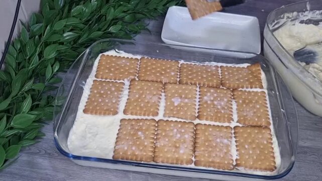 Layering Pineapple Cake with Pudding and Biscuits in Glass Dish