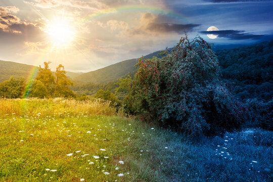rural mountain landscape of ukraine at twilight. countryside scenery of transcarpathia in summer. night meet day concept. forested hills and grassy meadows under epic sky