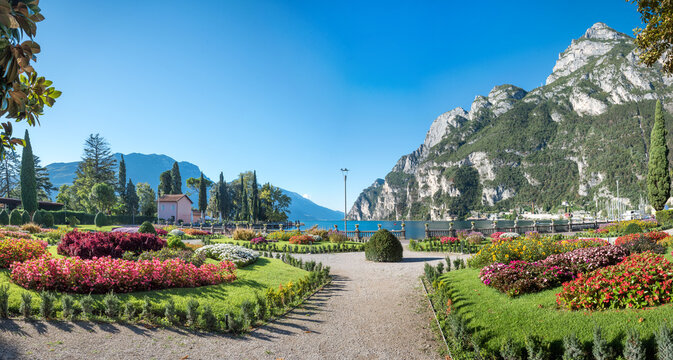beautiful park with colorful flower beds, tourist resort Riva del Garda, italy