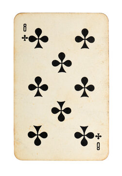 Old vintage Eight of Clubs playing card isolated on white.