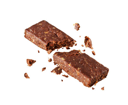 Broken chocolate cereal energy bar close-up isolated on a transparent background