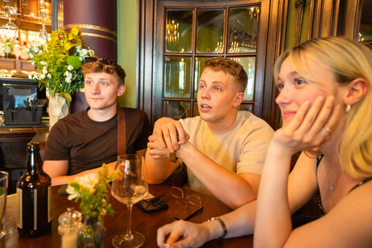 Group of friends sharing a social moment in England