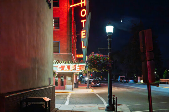 Night view of the neon lights of the 1904 Murray Hotel and Cafe on Park Street in downtown Livingston Montana, a local landmark known for it's famous clientele and hand-cranked elevator, July 21 2026.