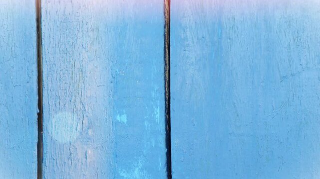 Seamless 4K looping vertical movement over a blue painted wall with a dark vertical seam. Suitable for minimalist backgrounds motion graphics and design projects.