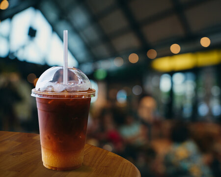 layered orange coffee in warm cafe mood