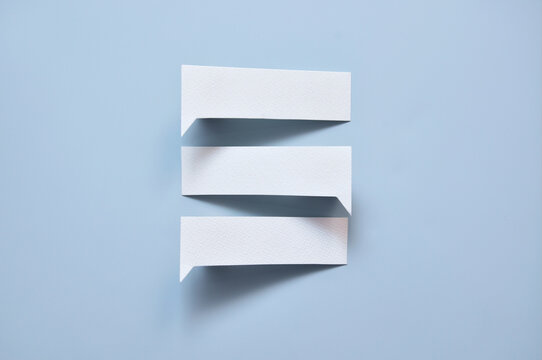 Three blank paper speech bubbles for communication concept
