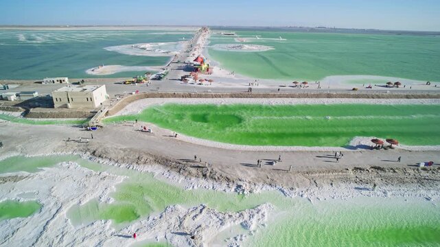 Aerial View of Ten-Thousand-Zhang Salt Bridge in Qarhan Salt Lake: Pure Emerald Water, White Salt Causeway and Sunlight in Qinghai