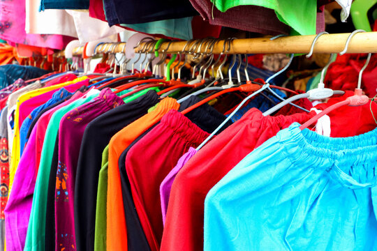 Colorful Women&rsquo;s Clothes Hanging on Rack in Boutique Store