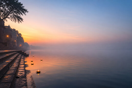 Floating diya lamps on river Ganges at Varanasi during sunrise. Traditional Hindu ritual with oil lamps on water surface. Spiritual meditation, culture, religion and faith concept.