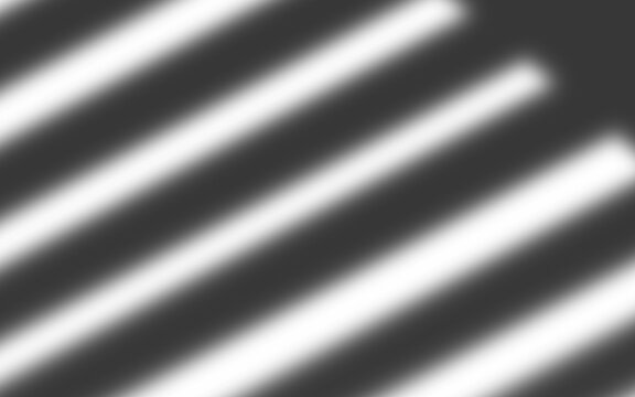 Abstract Shadow Overlay Effect of Window Blinds with Soft Focus Diagonal Light Rays on Neutral Wall Surface