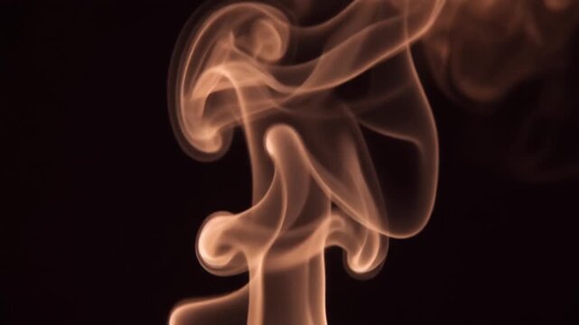 Chestnut-brown smoke coils and drifts upward, tendrils thickening and thinning continuously under warm side lighting against deep black with rich moody atmosphere and cinematic texture.