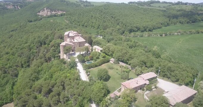 Val d'Orcia, Tuscany, Italy, aerial drone view, winding road with cypresses