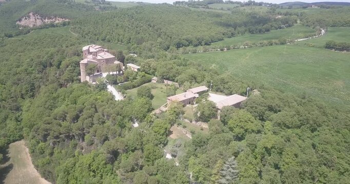 Val d'Orcia, Tuscany, Italy, aerial drone view, winding road with cypresses