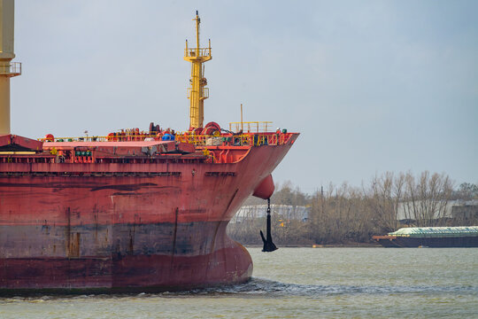 Bow of Cargo Ship Traveling Upriver on the Mississippi River in New Orleans, LA, USA