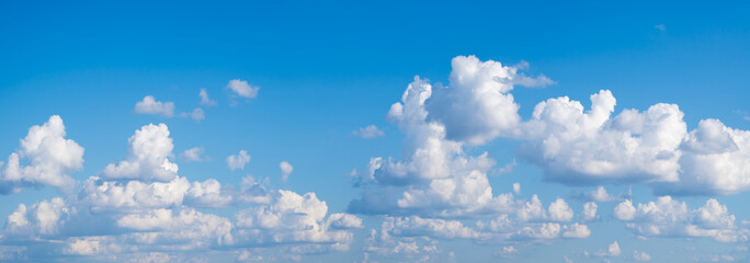 Wide panorama heaven blue sky with many white clouds. Sky blue background for internet website...