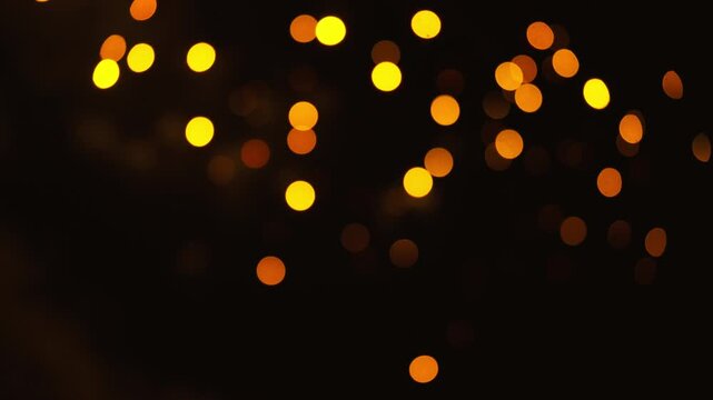 Abstract bokeh fireworks exploding in the night sky
