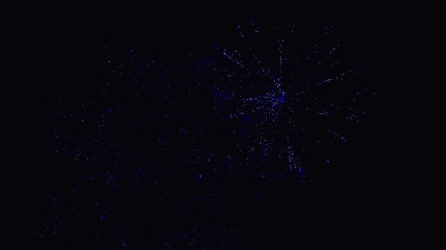 Blue festive fireworks exploding in the night sky