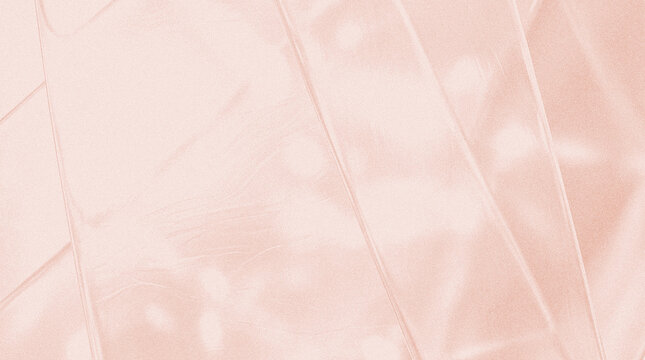 Abstract soft pink background with gentle light reflection and subtle texture, creating a delicate and calming aesthetic