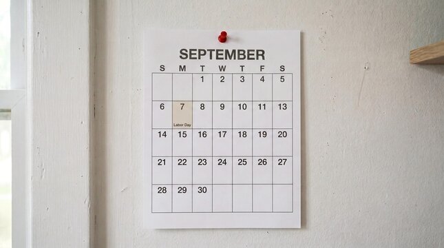 Wall calendar for september with labor day highlighted on the 7th