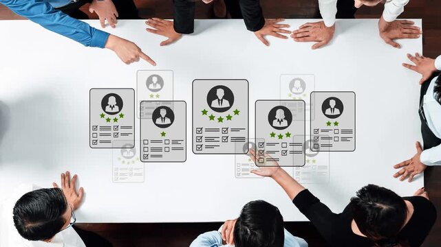 Group of professionals discussing profiles on a table with ratings and evaluations, emphasizing teamwork, analysis, and decision-making in a modern setting Gluon.