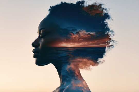 Dawn-lit silhouette of a woman filled with sea and sky, a visual metaphor for empowerment and mindful growth