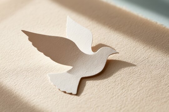 Delicate papercraft dove silhouette symbolizing peace against a soft neutral background