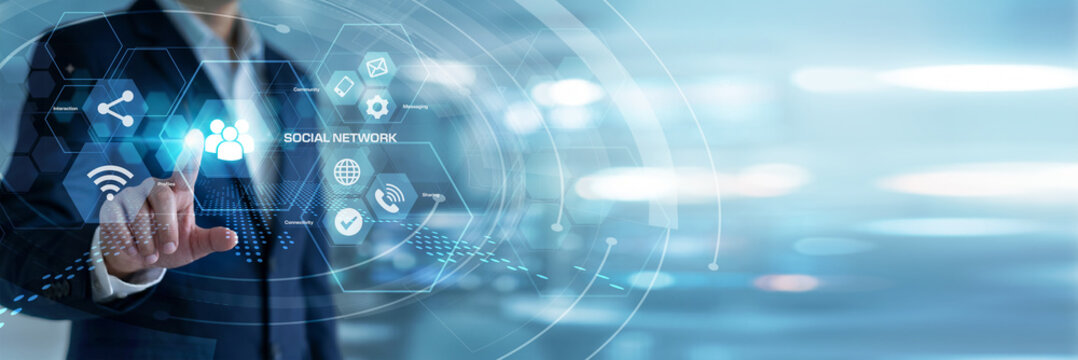 Community manager reviewing and touching Social Network engagement graphs on a vibrant virtual screen. User interaction demographics, viral content algorithms, and digital connectivity.