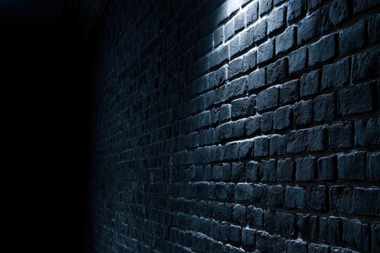 Dark brick wall with a single harsh spotlight illuminating the textured surface