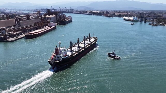 Freight Ship At Santos In Sao Paulo Brazil. Port Of Santos Scenery. Cargo Ship. Maritime Transportation. Freight Ship At Santos. Freight Ship Sailing.