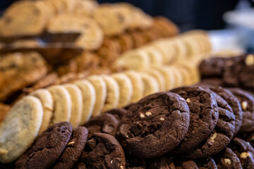 Fototapeta premium Delicious selection of assorted chocolate and sugar cookies. Dessert, culinary or hospitality background banner.