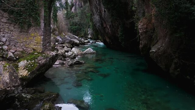 Turquoise River Flowing Through Rocky Canyon Gorge